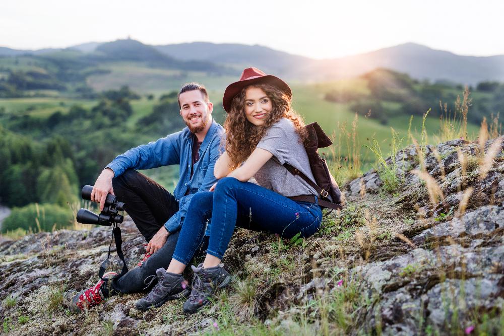 couple hiking on mountain | cosmetic dentist los gatos ca