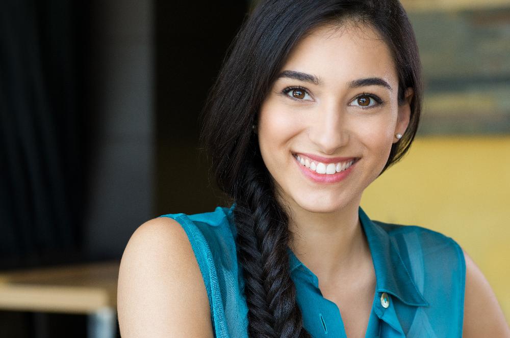 woman with braid smiling | dental bonding los gatos ca