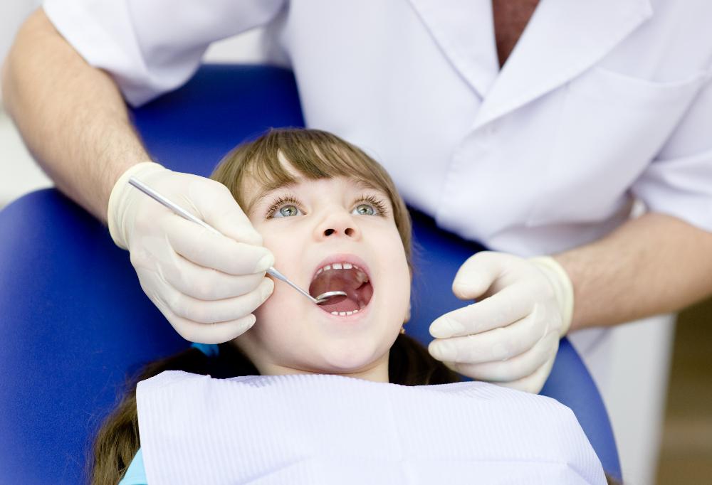 child receiving dental cleaning | los gatos ca dentist