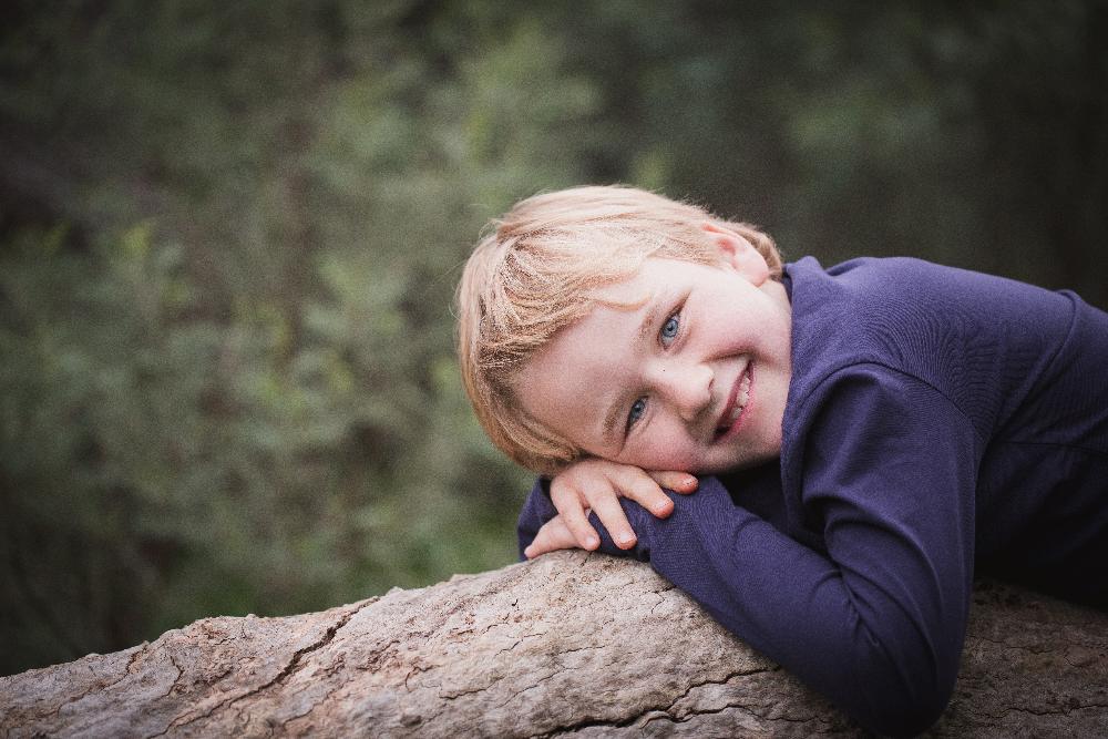 young boy smiling with sweater | tooth-colored fillings los gatos ca