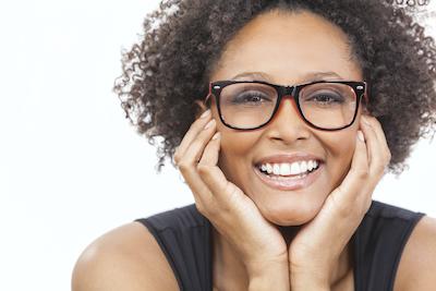 woman with curly hair smiling | teeth whitening los gatos