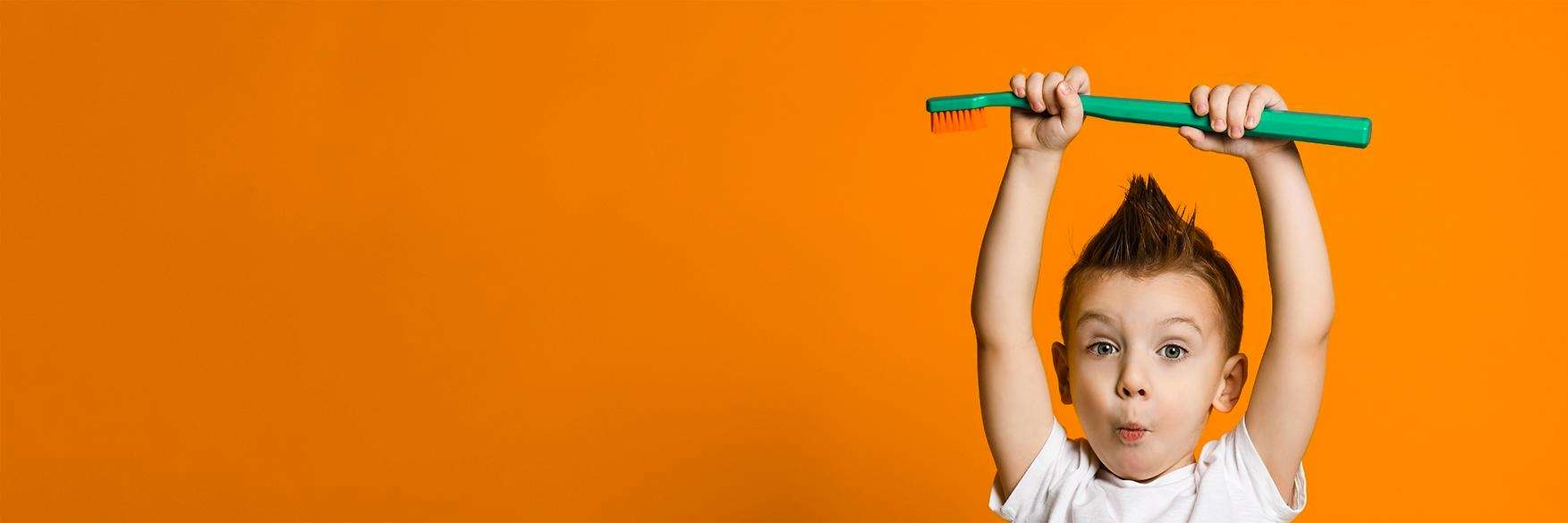 Young boy with toothbrush, childrens dentistry los gatos ca