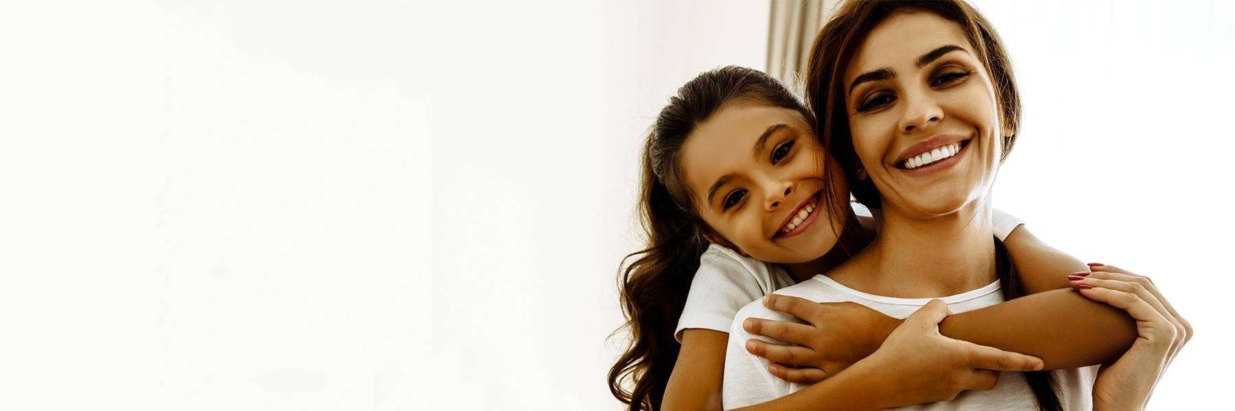 Mom and daughter smiling | family dentistry in los gatos ca