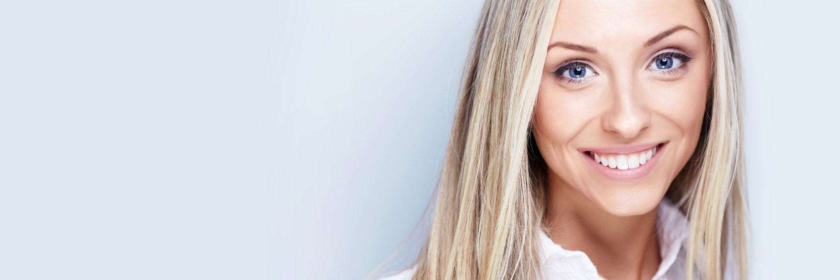 woman smiling after teeth whitening by dentist in los gatos ca