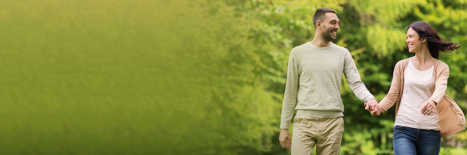 young couple holding hands | cosmetic dentist los gatos ca